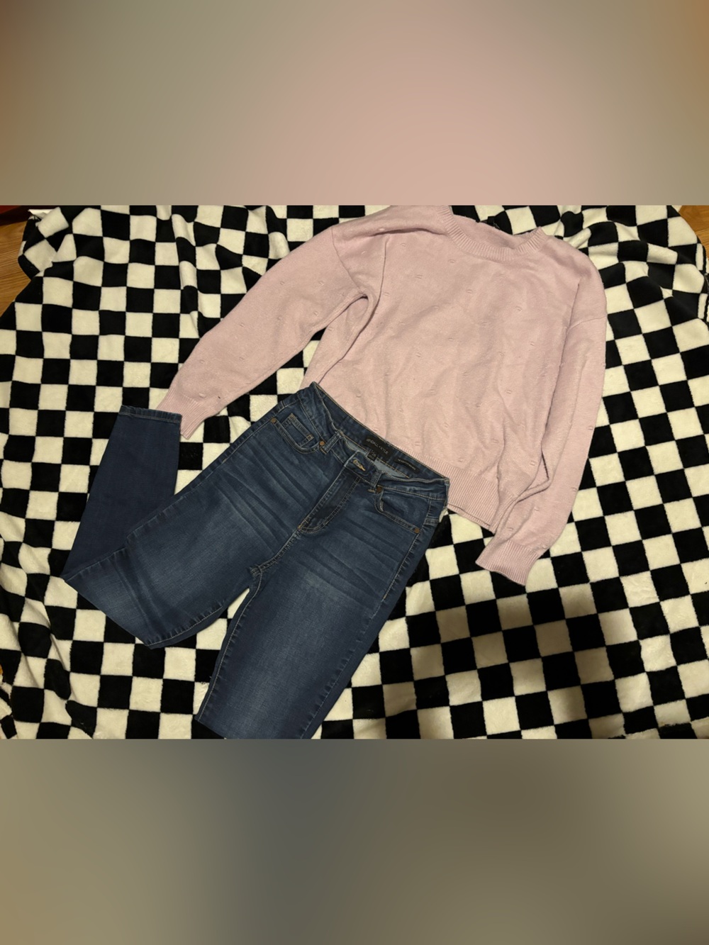 Kendall and Kylie size 28 high rise skinny jeans with a size large sweater